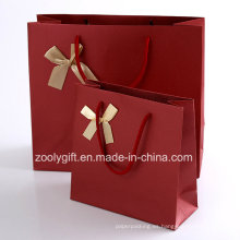 La calidad Textured los bolsos de papel del arte con el arco de la cinta / el bolso del regalo del papel de la boda del color rojo